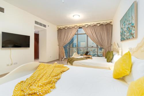 Cama o camas de una habitación en Ocean View Luxury Suites