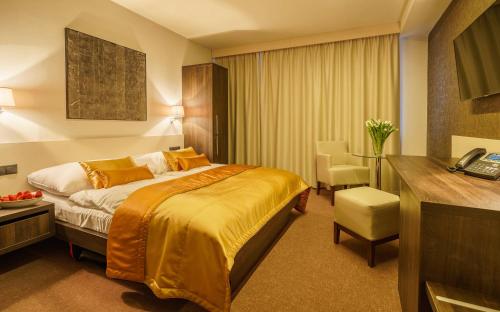 Postel nebo postele na pokoji v ubytování Horizont Resort
