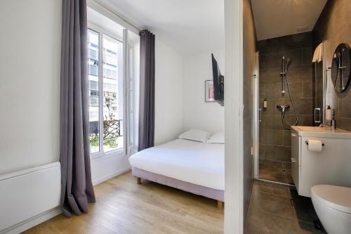 Kúpeľňa v ubytovaní Résidence Paris Ivry House
