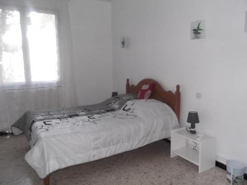 Ένα ή περισσότερα κρεβάτια σε δωμάτιο στο Chouette coquette
