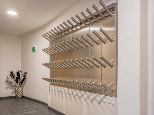 a closet with stainless steel shelves on the wall at Deluxe Zirberl Top 6 in Weisspriach