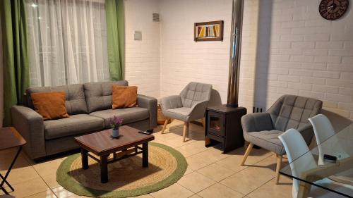 Χώρος καθιστικού στο Casa Huedhued