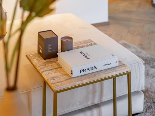 a table with books and candles on it at Villa Filzer in Kirchberg in Tirol