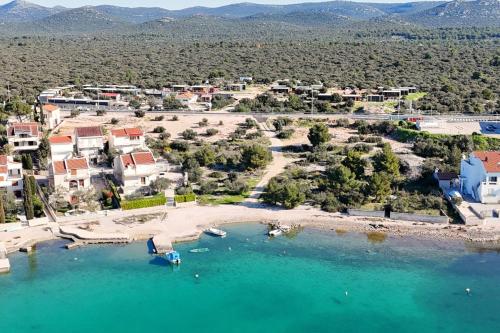an aerial view of a small island in the water at Apartments by the sea Pirovac, Sibenik - 15403 in Pirovac