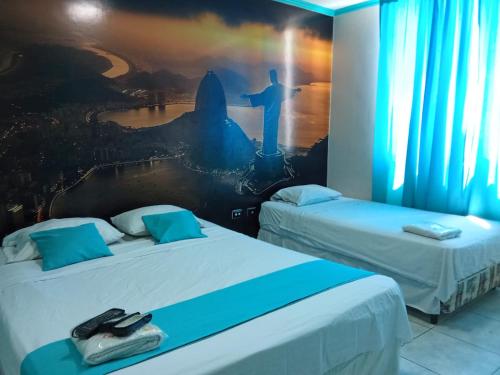 Postel nebo postele na pokoji v ubytování HoTEL COPACABANA