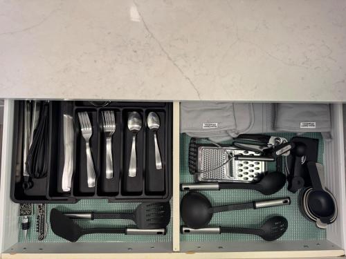 a drawer full of kitchen utensils at 10 min to Red Rocks KING BED Bike Storage DT Golden in Golden