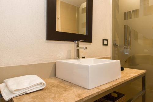 Ванная комната в Rivadavia Apartamentos