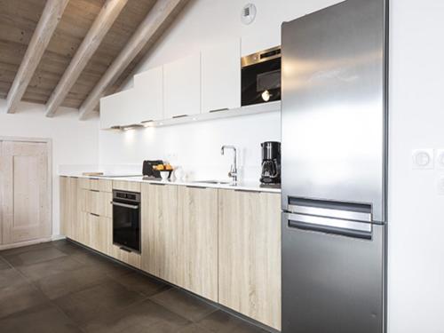 Photo de la galerie de l'établissement Cozy apartment in La Rosière with ski access, à La Rosière