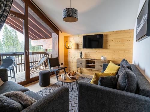 Photo de la galerie de l'établissement Charming alpine apartment with panoramic views, à Combloux