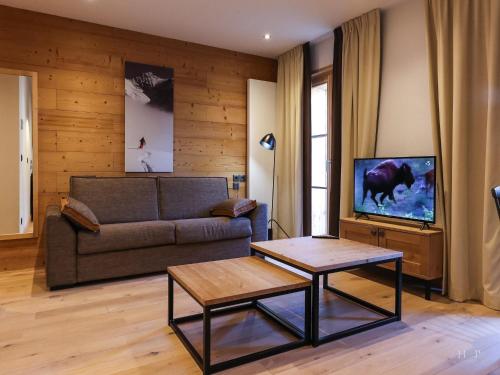 Μια τηλεόραση ή/και κέντρο ψυχαγωγίας στο Chalet in Combloux with Mont-Blanc Views