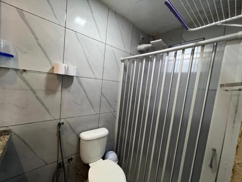 a bathroom with a toilet and a shower at Residencial JC II sua casa em Belém do Pará in Belém