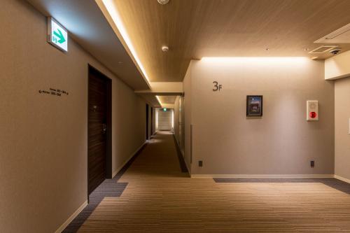 a hallway of a building with a hallway at Tabi and Nagasaki Grand Open!! 2025 in May in Nagasaki