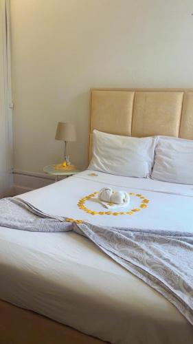 Postel nebo postele na pokoji v ubytování WW Hostel & Suites