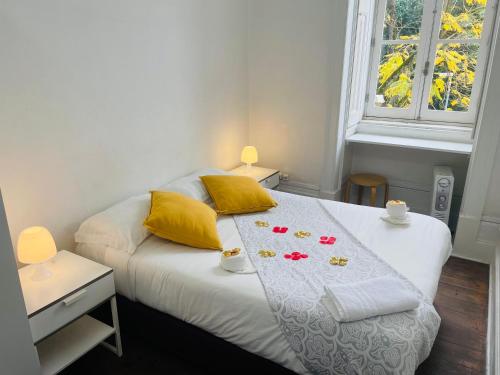 Postel nebo postele na pokoji v ubytování WW Hostel & Suites