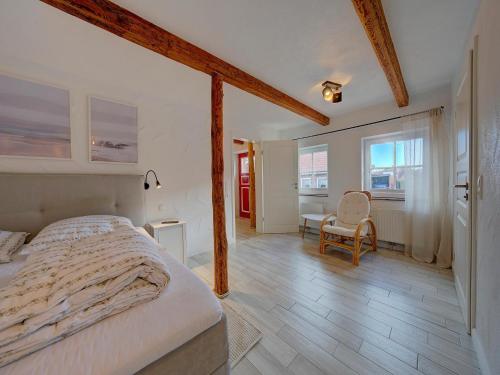 Ένα ή περισσότερα κρεβάτια σε δωμάτιο στο Charmantes Haus mit Garten in Petersdorf