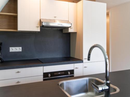 Η κουζίνα ή μικρή κουζίνα στο Holiday Home in Forest near Assen