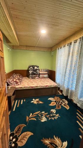 Postel nebo postele na pokoji v ubytování The Good Time homestay
