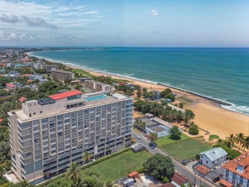 an aerial view of a hotel and the beach at Ocean Breeze Sea View Luxury Apartments in Negombo