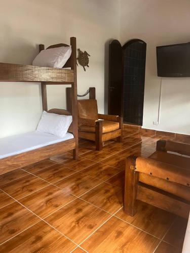 Postel nebo postele na pokoji v ubytování Cantinho no litoral