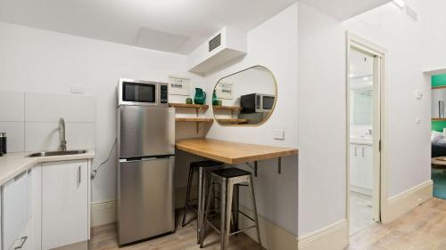 Η κουζίνα ή μικρή κουζίνα στο Gordon House Apartments