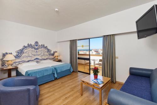 Postel nebo postele na pokoji v ubytování Hotel Apartamento Brisa Sol