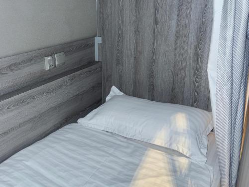 Ένα ή περισσότερα κρεβάτια σε δωμάτιο στο Futura Boutique Hostel