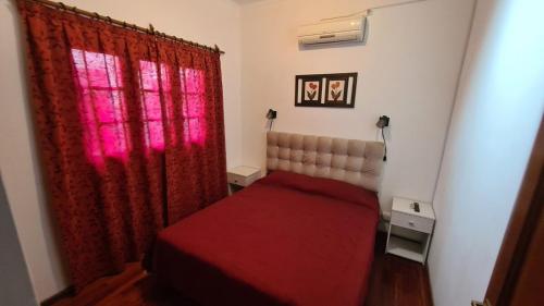 Postel nebo postele na pokoji v ubytování Departamento cálido y rustico!!!
