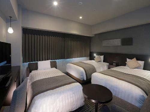 Katil atau katil-katil dalam bilik di Hiroshima Washington Hotel