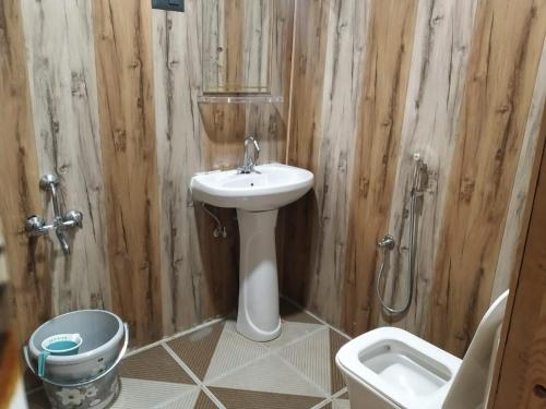 a bathroom with a sink and a toilet at ABBA'S homestay in Srinagar