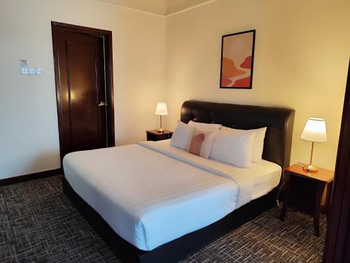Postel nebo postele na pokoji v ubytování Citypluse Suites at Times Square Kuala Lumpur