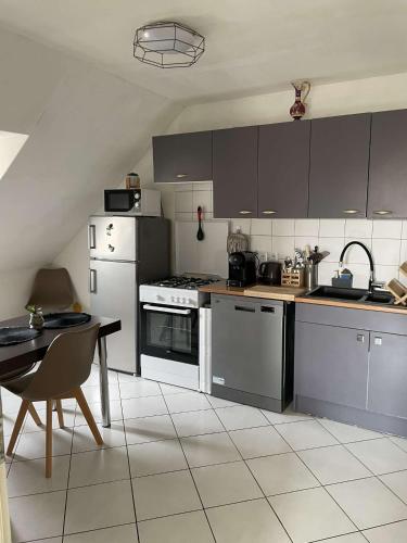 Joli appartement avec place de parking Privé