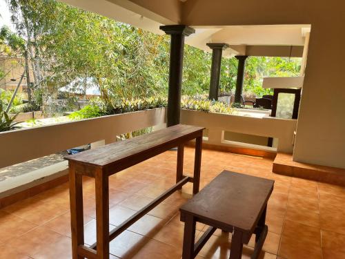 Balkón nebo terasa v ubytování BAVA Beach Resort & Retreat Center Varkala