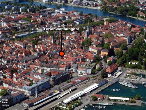 an aerial view of a city with a red circle at Atelier Probst- Salmannsweilergasse in Konstanz