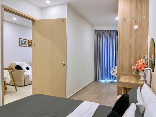 Postel nebo postele na pokoji v ubytování The Sóng Apartment 5 Stars Vung Tau - Căn Hộ Du Lịch Biển 5 Sao Vũng Tàu - MINH TOẢN's Homestay