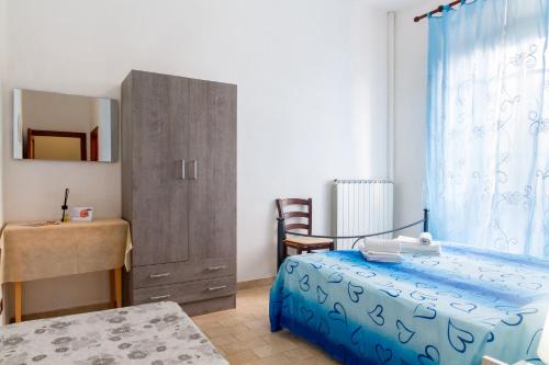 Postel nebo postele na pokoji v ubytování Agriturismo Tramonto in Maremma