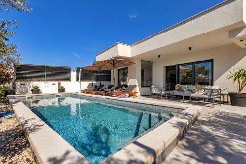 Villa Festina lente a luxury villa in Makarska, heated pool
