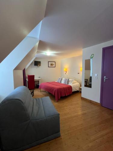 Postel nebo postele na pokoji v ubytování Hotel Le Progrés Dorlotel
