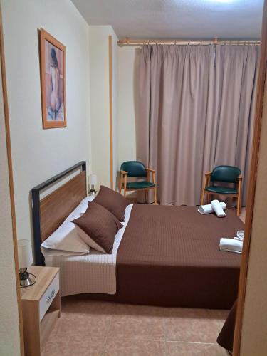 Letto o letti in una camera di Hostal Doña María