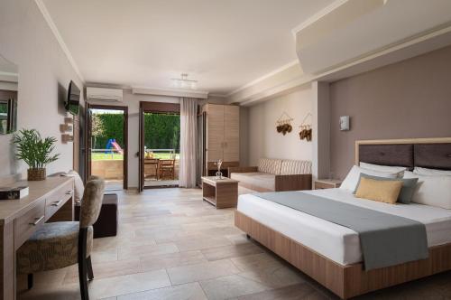 Postel nebo postele na pokoji v ubytování Anthemida Rooms