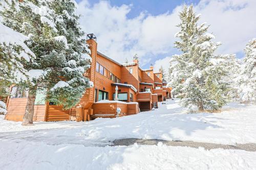 a home in the winter with snow on the ground at Tennis Townhome 2 Bd 25 Ba TTMR in Keystone