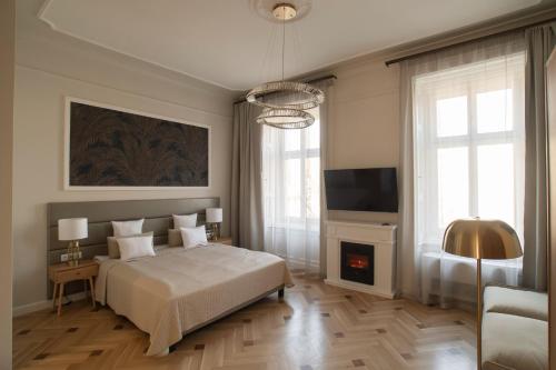 Posteľ alebo postele v izbe v ubytovaní Harmonia Palace