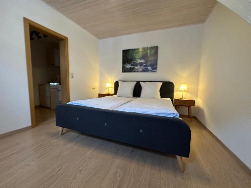 Ένα ή περισσότερα κρεβάτια σε δωμάτιο στο Hotel Gerlach
