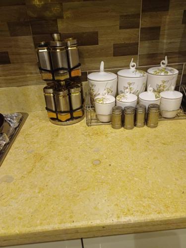a group of containers sitting on top of a counter at Hurghada Sea View Apartment in Hurghada