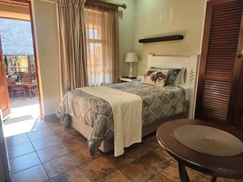 Ένα ή περισσότερα κρεβάτια σε δωμάτιο στο Goodnight Guest Lodge