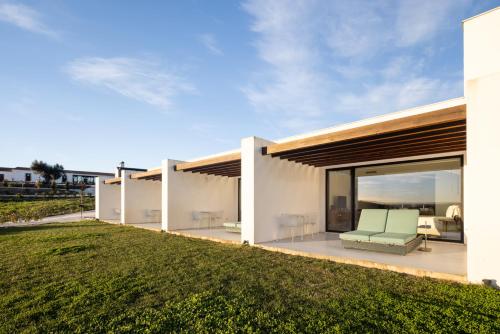 a view of a house with a lawn at Land of Alandroal in Alandroal