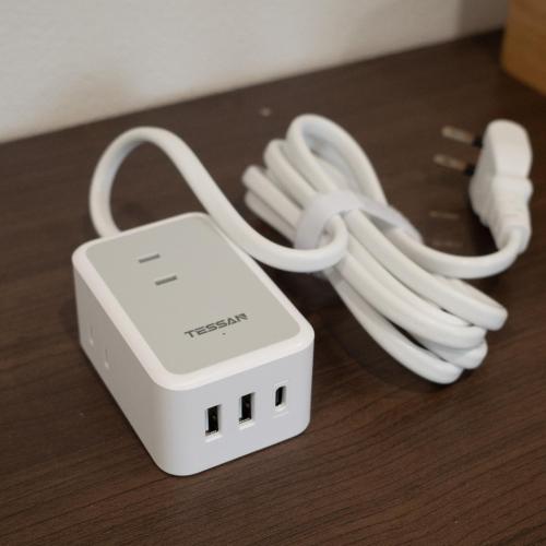 a white nintendo wii controller sitting on a table at LOFT-Hatsudai hostel初台SY0362 in Tokyo