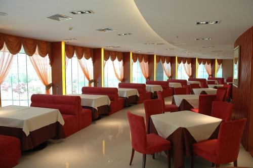 A restaurant or other place to eat at Ramada Encore by Wyndham Wuhan Int'l Conference Center