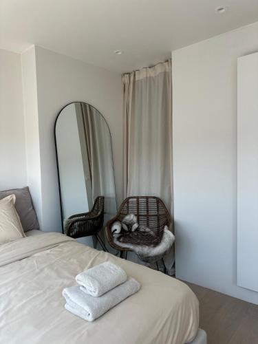 Katil atau katil-katil dalam bilik di Dakappartement V, 2de verdiep TML