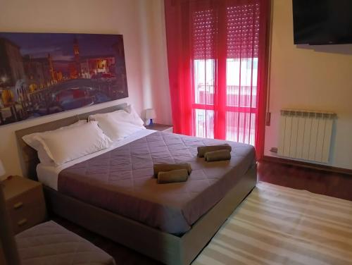 Postel nebo postele na pokoji v ubytování B&B Verrazzano affittacamere
