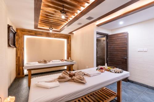 a bathroom with two sinks and a mirror at Temple Bell Boutique Hotel & Spa in Pokhara